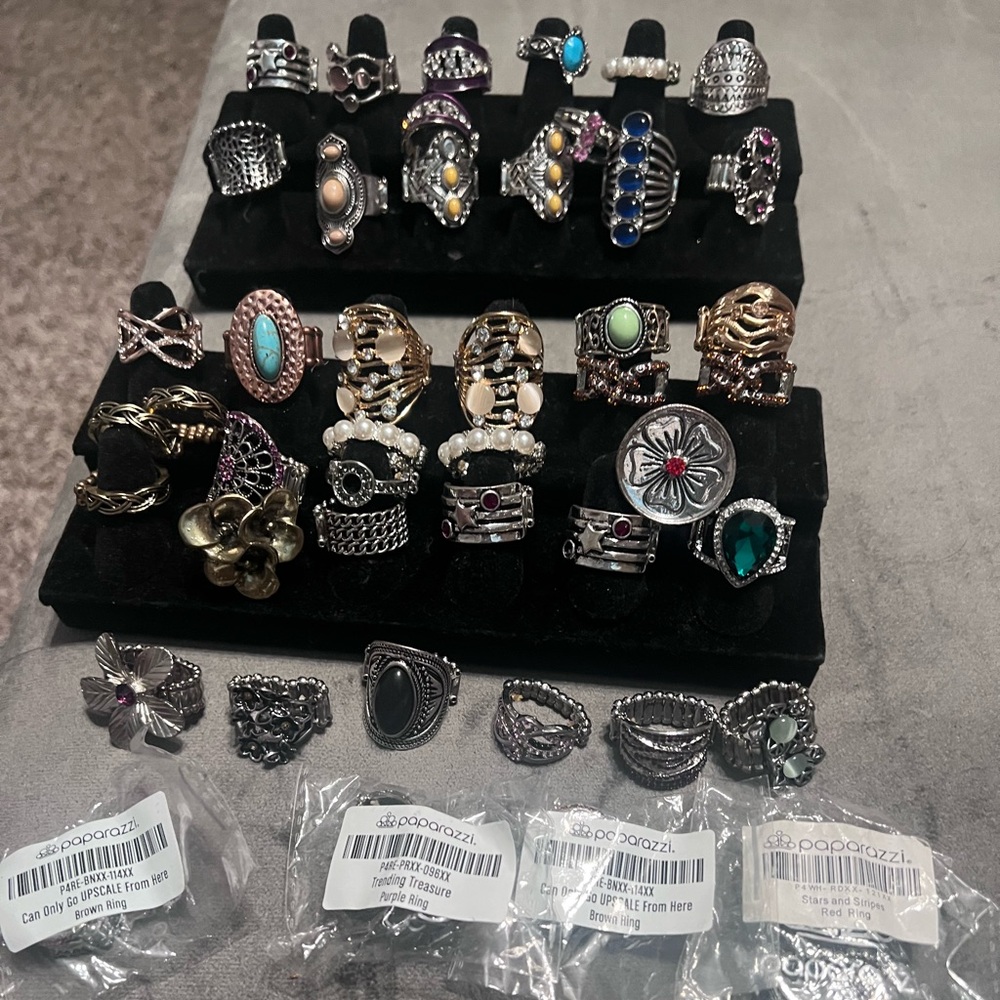 Lot of  Paparrazi rings. New never worn elastic band.